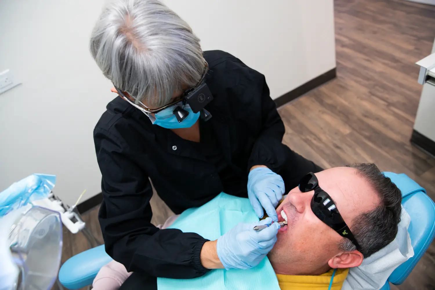 Close-up of toothbrush and floss promoting daily oral hygiene