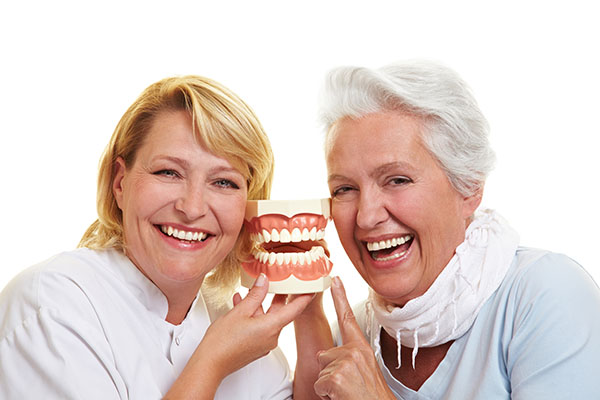 Close-up of a bright smile with well-fitted removable dentures